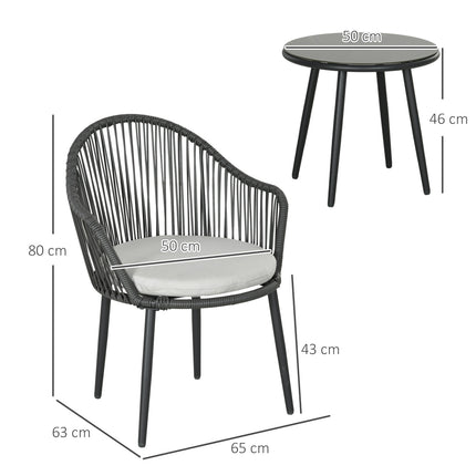 Rattan garden furniture - 2 chairs and table, cushions included