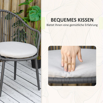Rattan garden furniture - 2 chairs and table, cushions included