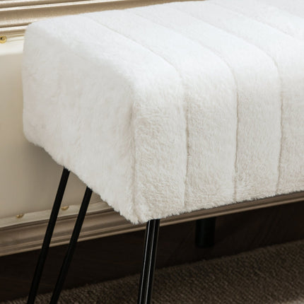 Upholstered cream bench with metal legs, faux fur look