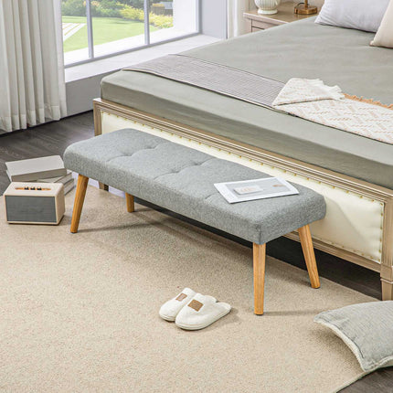 Gray upholstered bench with button seams, 120x41x43 cm
