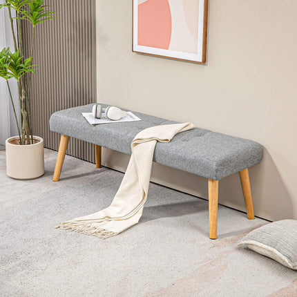 Gray upholstered bench with button seams, 120x41x43 cm