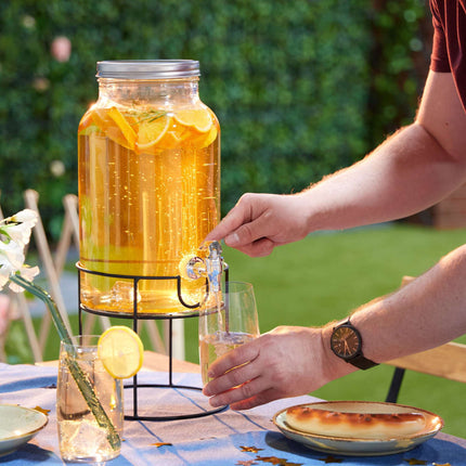 Beverage dispenser with stand