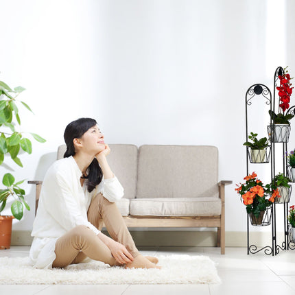 Black flower pedestal in metal