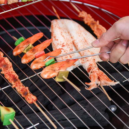 Red metal charcoal grill with wheels, 51x70x75.5cm