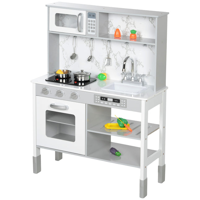 Adjustable play kitchen for children with stove and accessories