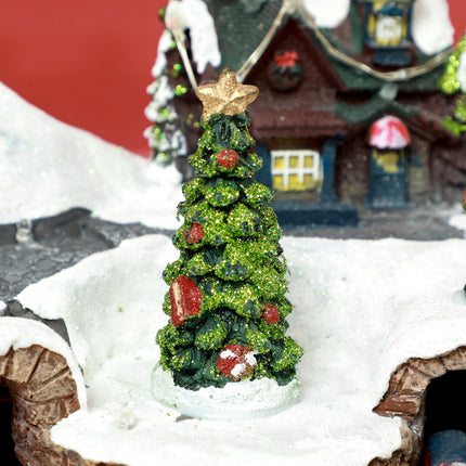 Christmas village with LED lights, music and moving train