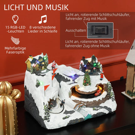 Christmas village with LED lights, music and moving train