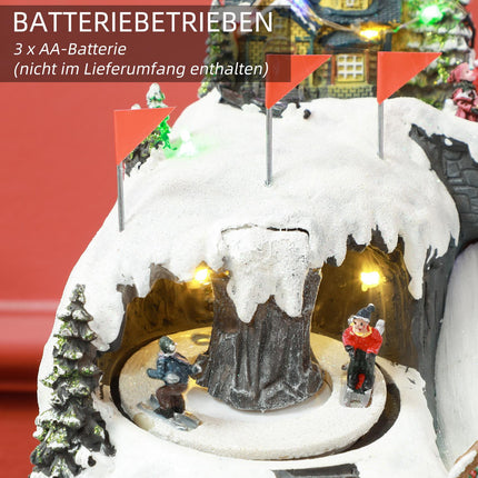 Christmas village with LED lights, music and moving train