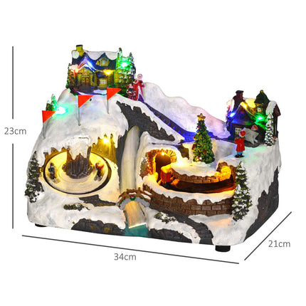 Christmas village with LED lights, music and moving train