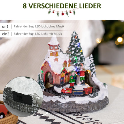 Christmas village with LED lights and moving train