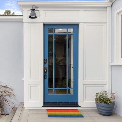 Door mat made of coconut in rainbows