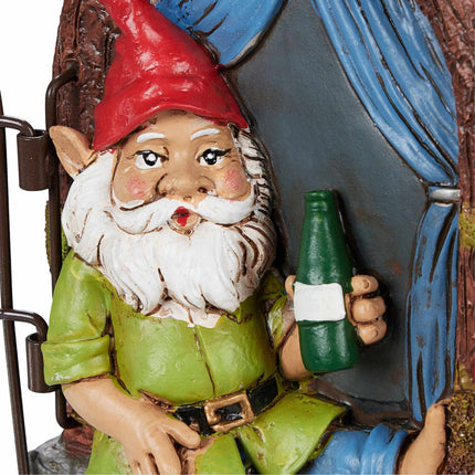 Drinking dwarf in the window
