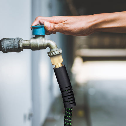 Flexible garden hose with hand shower