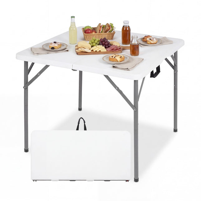 Opklapbare tafel van 86 cm bij 86 cm, met handvat en metalen poten.