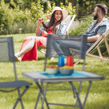 Folding garden table with glass top