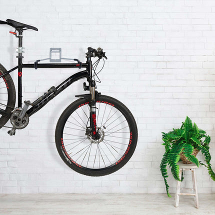 Folding wall bracket for bicycle