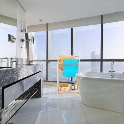 Freestanding towel rail with shelf