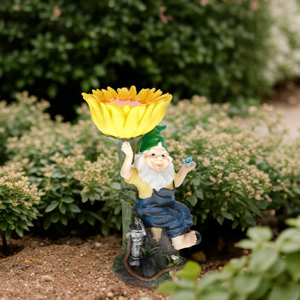 Garden gnome with bird bath