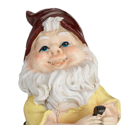Garden gnome with lantern