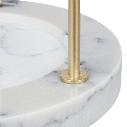 Gold colored jewelry stand with marble base