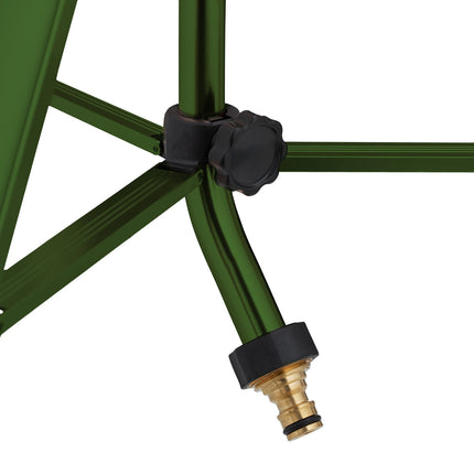Green sprinkler with metal stand