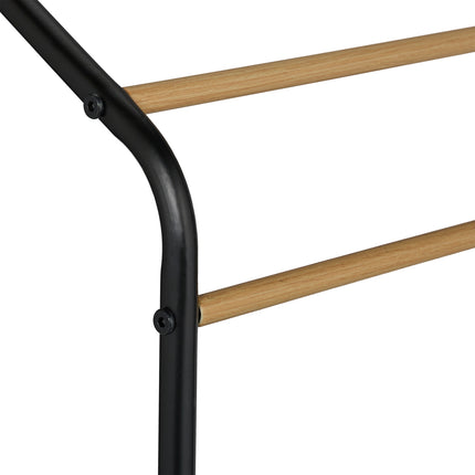 Metal towel rail with shelf