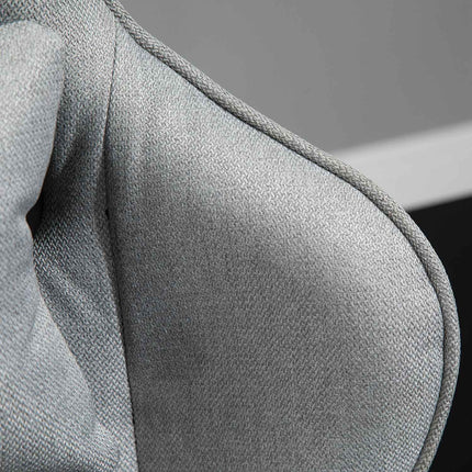 Ergonomic gray office chair with head and lumbar cushions
