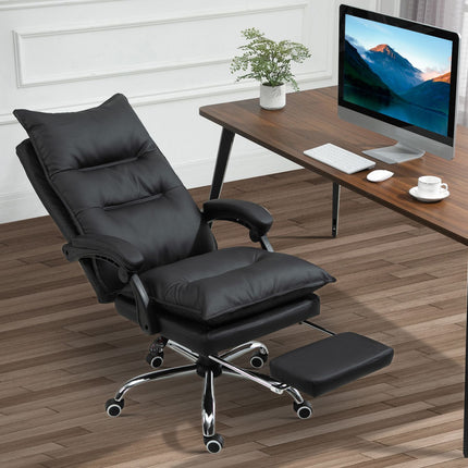 Black office chair in synthetic leather with adjustable footrest