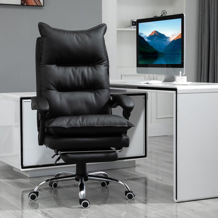 Black office chair in synthetic leather with adjustable footrest