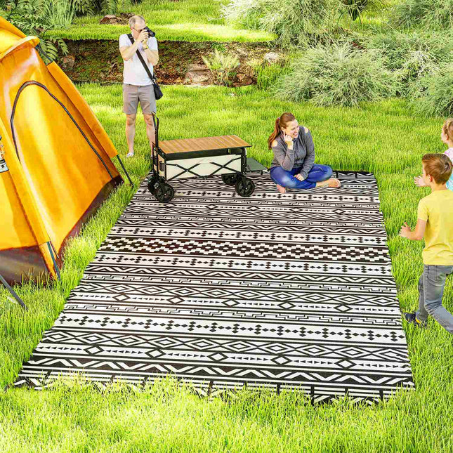 Weather resistant outdoor rug - Foldable black and white, 548x274 cm