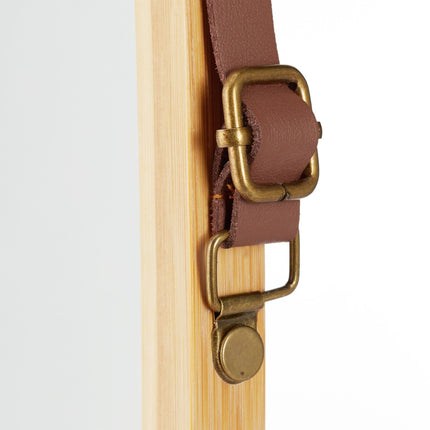 Oval wall mirror with strap