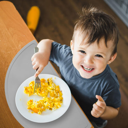 Placemat for children in a semi-circular shape