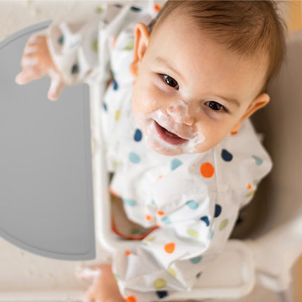 Placemat for children in a semi-circular shape
