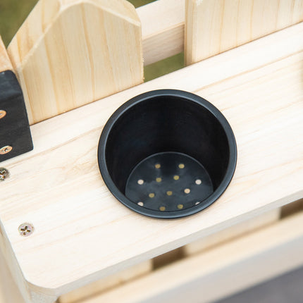 Wooden play kitchen with pots and tools in stainless steel