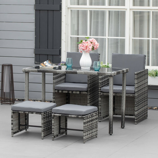 Poly rattan 4-seater garden dining set with cushions, gray