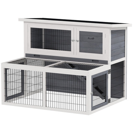 Two-story rabbit hutch with outdoor enclosure