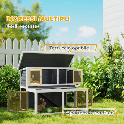 Two-story rabbit hutch with outdoor enclosure