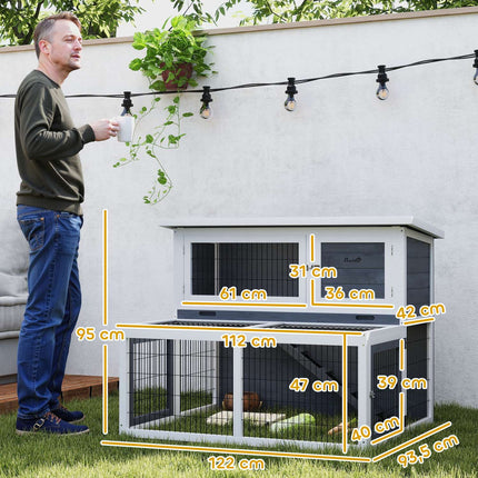 Two-story rabbit hutch with outdoor enclosure