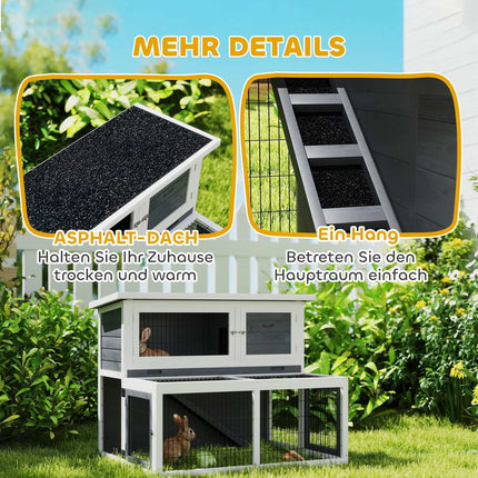 Two-story rabbit hutch with outdoor enclosure