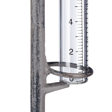 Rain gauge water faucet