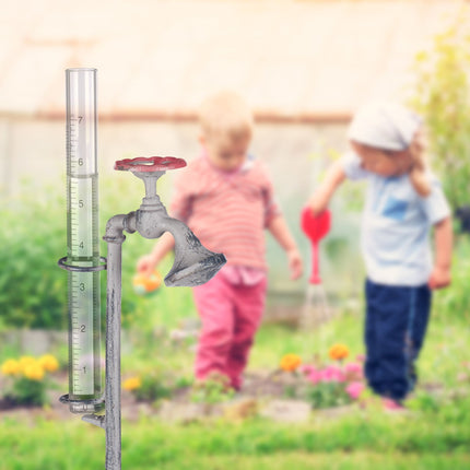 Rain gauge water faucet