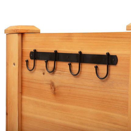 Raised wooden bed for herbs and flowers, with drainage and hooks