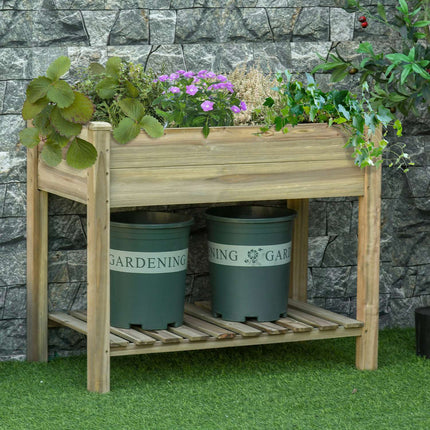 Raised wooden garden bed with shelf and drainage hole