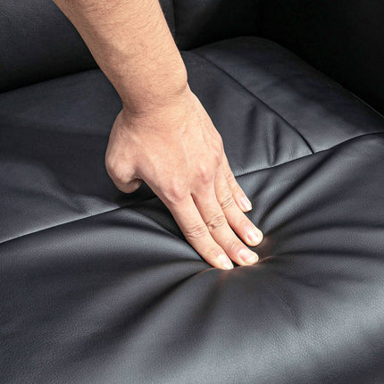 Black reclining swivel chair in artificial leather with stool
