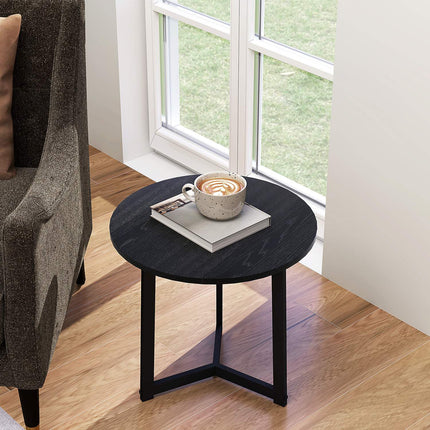 Round coffee table with steel frame - modern black design