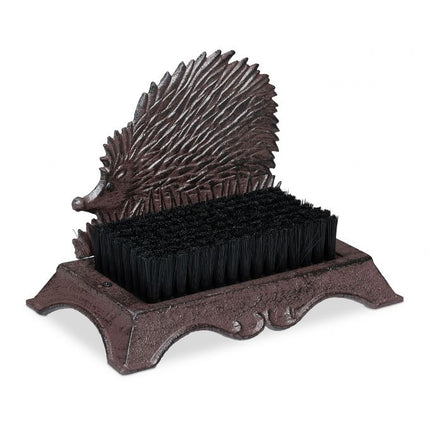 Shoe brush in cast iron with animal motifs