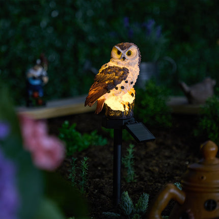 Solar owl with woodpecker
