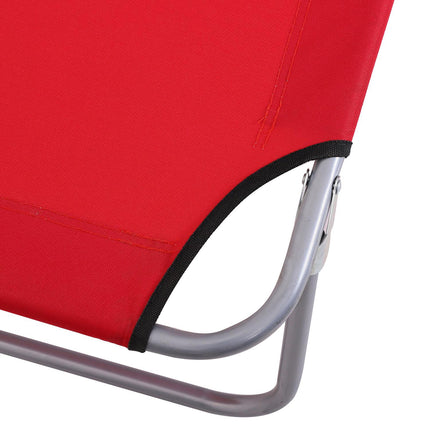 Folding red sun lounger with sun protection for outdoor use