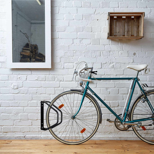 Swivel wall-mounted bicycle rack