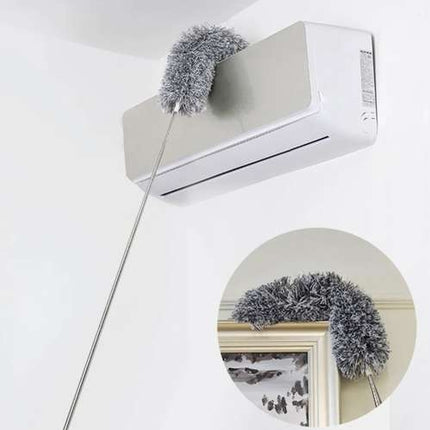 Telescopic dust brush with two attachments